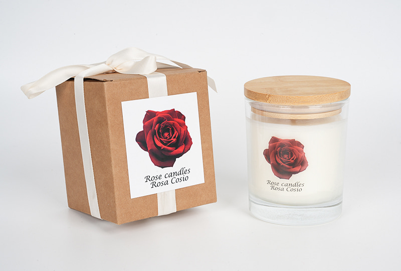 Bougie en pot en verre à couvercle doré et imprimé rose