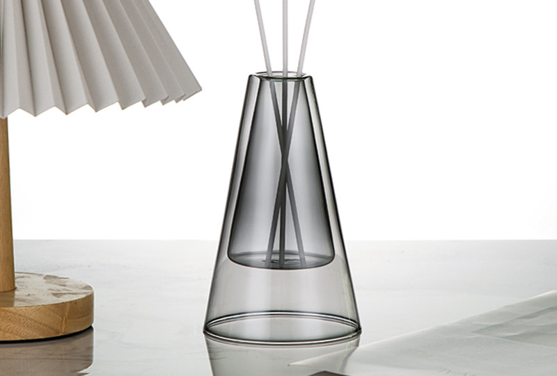 Bouteille de diffuseur en verre à chambre intérieure flottante