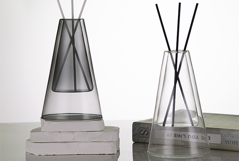 Bouteille de diffuseur en verre à chambre intérieure flottante