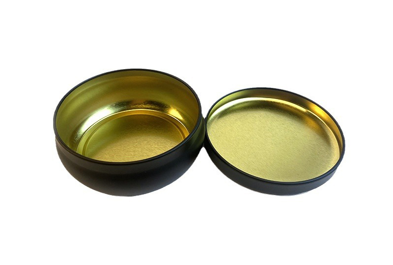 Pot rond en métal avec bougie noire avec couvercle
