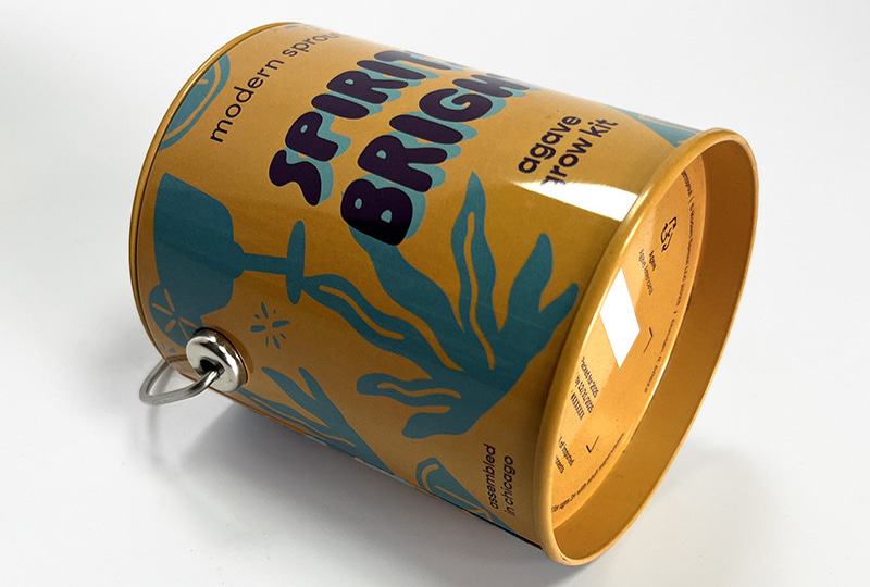 Bougie en pot en métal avec poignée en étain et imprimé saisonnier