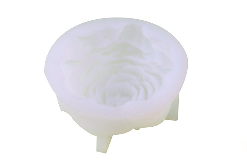 Moule à bougie en silicone avec visage de rose en pleine floraison