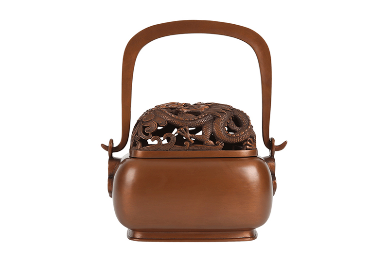 Brûleur d'encens traditionnel en forme de dragon sculpté en cuivre