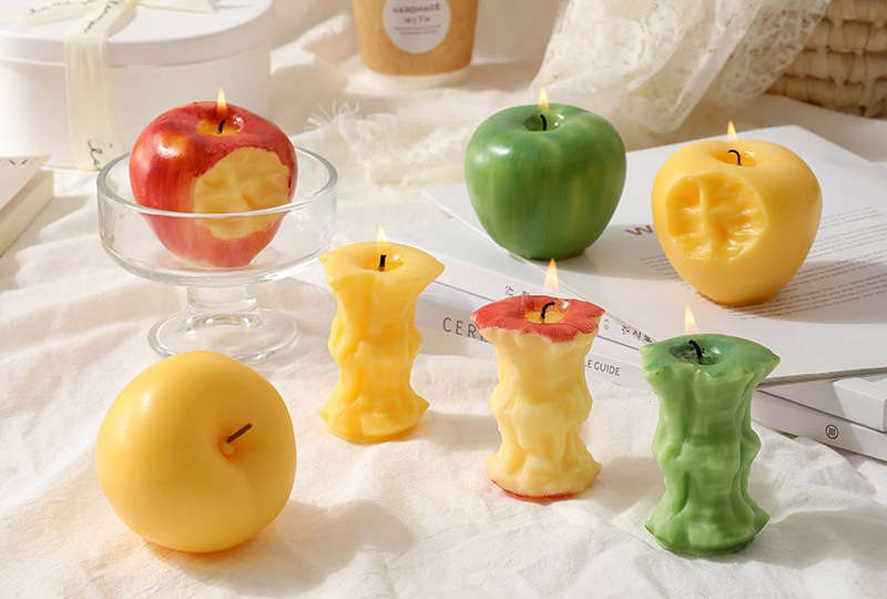 Bougie faite à la main de la série Festival en forme de fruit réaliste